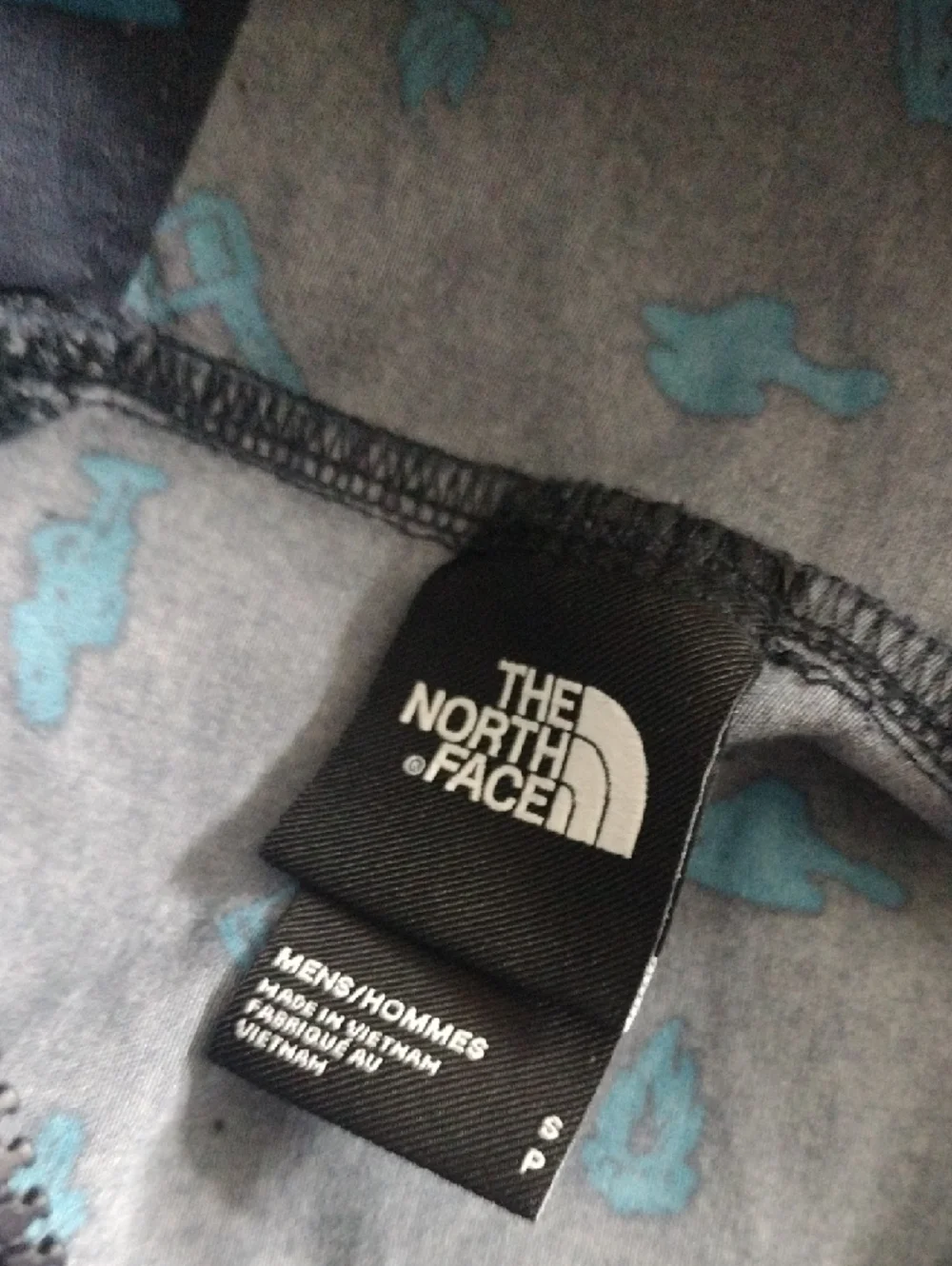 The North Face Navy Pullover Anorak with Teal Print